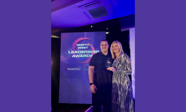 Angela Mansell celebrates Leadership Award win